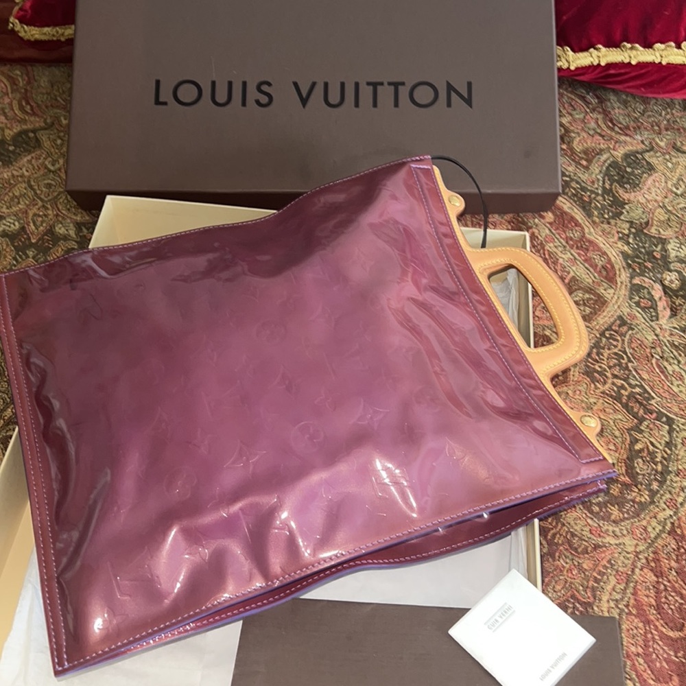 Authenticated Louis Vuitton purple bag